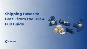 Blue-background image showing the text "Shipping Boxes to Brazil from the UK: A Full Guide" and the "EUROBR." logo, with an isometric illustration of boxes, a lorry and a route connecting the United Kingdom to Brazil.